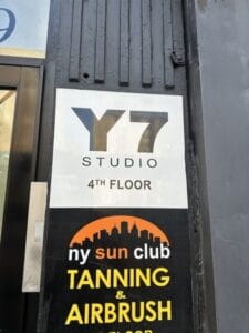y yoga upper east nyc signage street