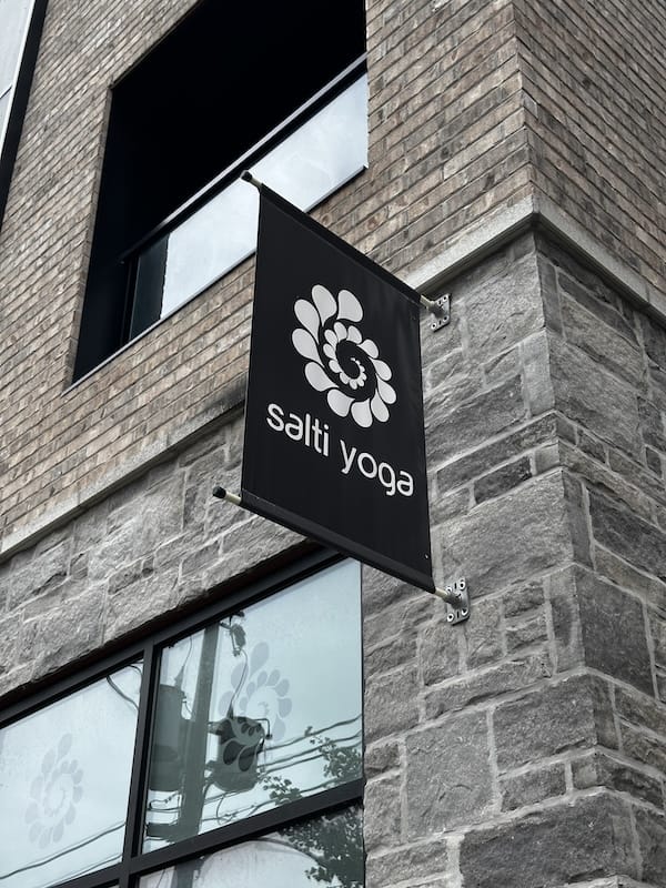 Salti Yoga Peterborough studio interior with yoga mats and warm lighting