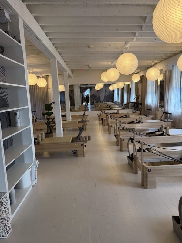 Coco Reformer Pilates Riverside: A sweat-tested Toronto Pilates review featuring a cozy, homey studio atmosphere and traditional reformer equipment.